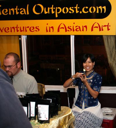 Ling Hua, the official translator of Oriental Outpost enjoys some white tea