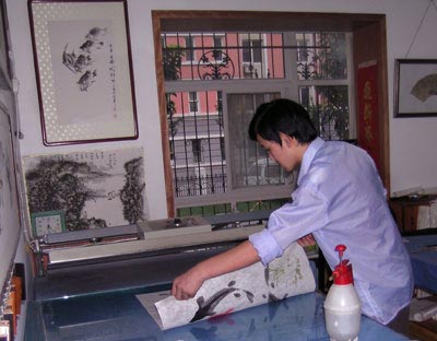 Loading the Asian artwork press